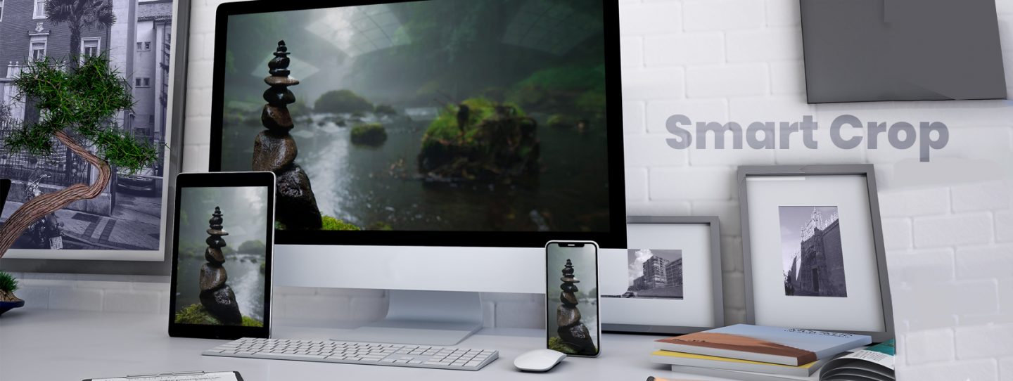 image of stacked pebbles on water perfectly cropped for a desktop, mobile and tablet all placed ona table with books, pictures and a bonsai tree