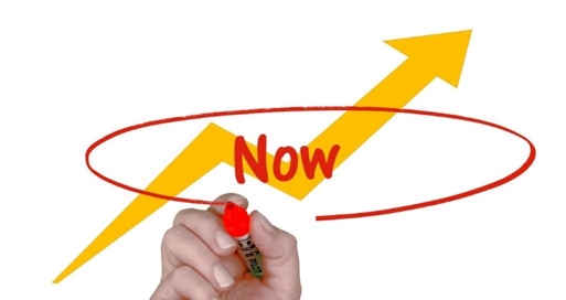 the word 'now' written across an upward trending arrow and circled with red